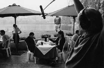 Boom Operator Kris Johnson on set - inches out of frame and on axis with the long pole.